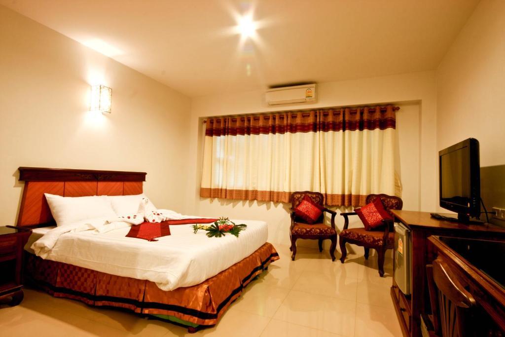 Chiangrai Grand Room Hotel Чианграй Номер фото